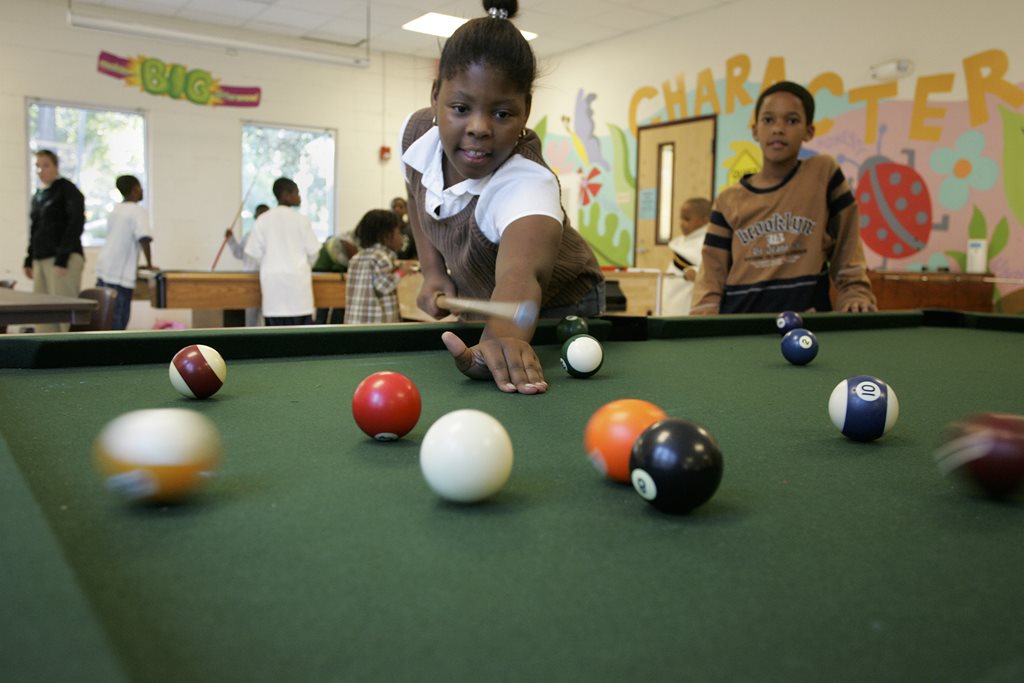 Youth playing pool at a JaxParks Community Center
