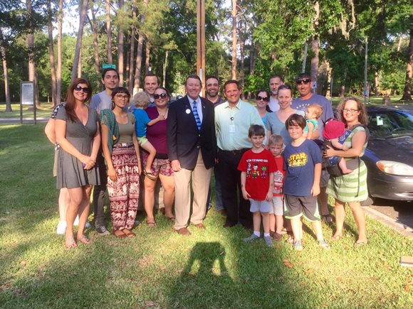 May 11, 2016 photo of Council Member Jim Love with area residents at Four Corners Park in Murray Hill.