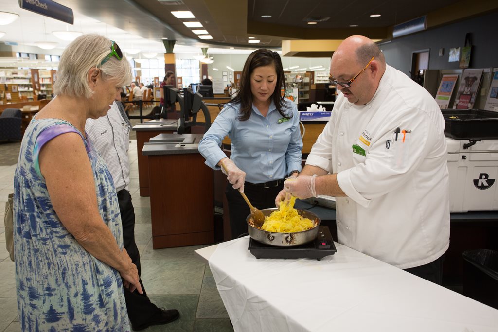 Chef's from Publix's Aprons program demonstrate a spaghetti squash recipe at a recent Turn It Up Thursday event at the Mandarin Branch Library.