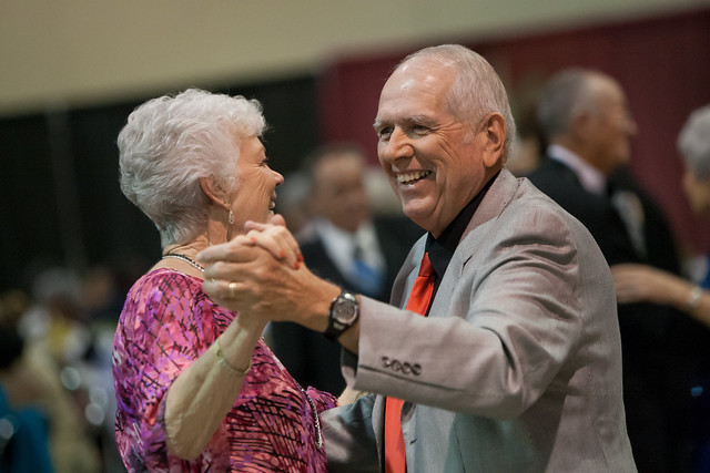 older couple dancing at senior prom event