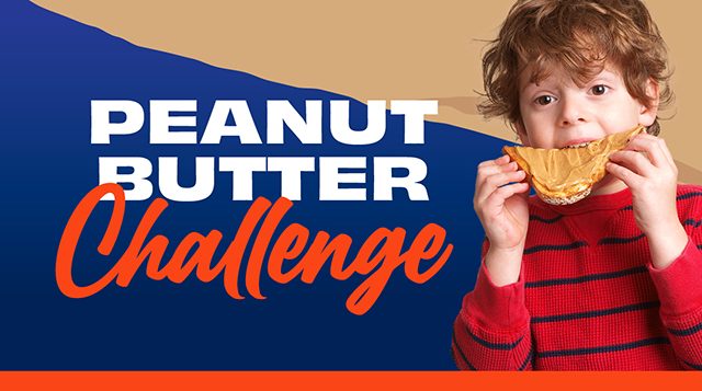 Child enjoying peanut butter sandwich