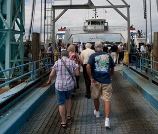 Photo of pedestrians boarding the Ferry.