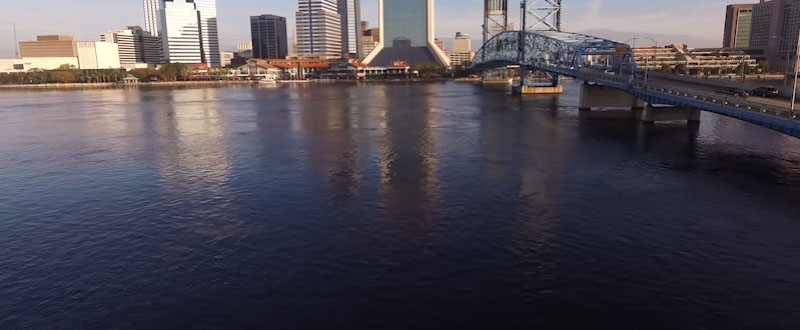 ExploreJax Header Video Showcasing Drone Footage Over Jacksonville and the St. Johns River