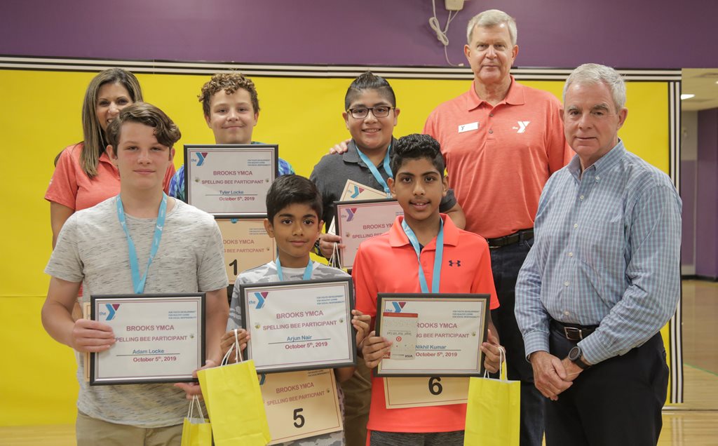 October 5, 2019 photo of Council Member Boylan with participants at the YMCA of Florida's First Coast Spelling Bee.