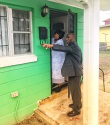 February 13, 2018 photo of Council Member Garrett Dennis and Mrs. Green at on onsite visit to evaluate a drainage issue on Penton Street and 18th Street. 