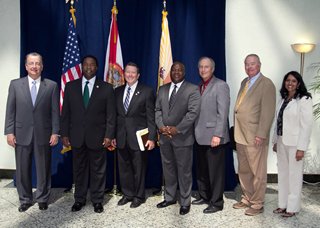 (From left) JEA CEO Paul McElroy; Mayor Alvin Brown; City Councilman Jim Love; JTA CEO Nat Ford; JAA CEO Steven Grossman; Jack Hall of Florida LambdaRail; Chief of COJ ITD Usha Mohan