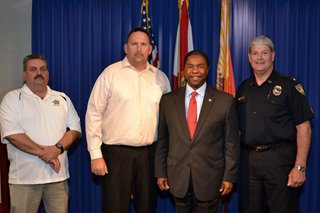 From left: Steve Amos, Fraternal Order of Police; Randy Wyse, Jacksonville Association of Fire Fighters; Mayor Alvin Brown; Assistant Chief Bobby Deal, Chairman of the Police and Fire Pension Fund Board of Trustees