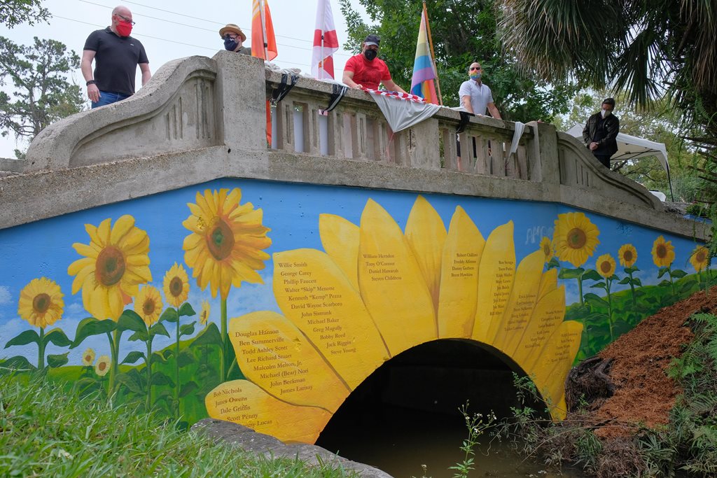 Residents unveiling the Willow Branch Park  culvert mural