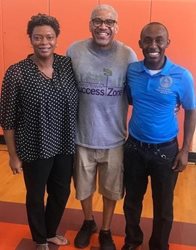 August 4, 2018 photo of Council Member Garrett Dennis and State Representative Tracie Davis at the New Town Success Zone 10th Annual Back to School Event.