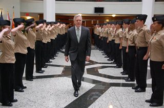 Secretary of the Navy Ray Mabus being greeted in the City Hall Atrium by JROTC cadets from Mandarin High School