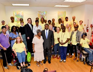Mayor Brown, Council Member Kimberly Daniels, St. John's Cathedral Dean Kate Moorehead, Aging True staff and residents of Cathedral Terrace