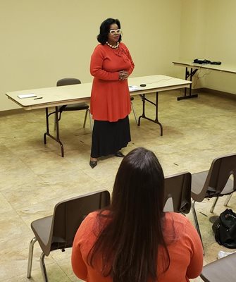 Photo of Council Member Ju'Coby Pittman at her District 8 Community Meeting held at Cisco Gardens Community Center