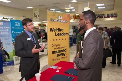 Two men talking at Military Job Fair Booth 2014