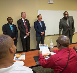 June 15, 2017 photo of Council Member Garrett Dennis, Michael Butler of Chase Bank, Mayor Lenny Curry, and Edward Waters College President Nat Glover at an orientation for small business owners.