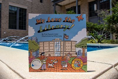 Photo of WE LOVE THE LIBRARY children's book