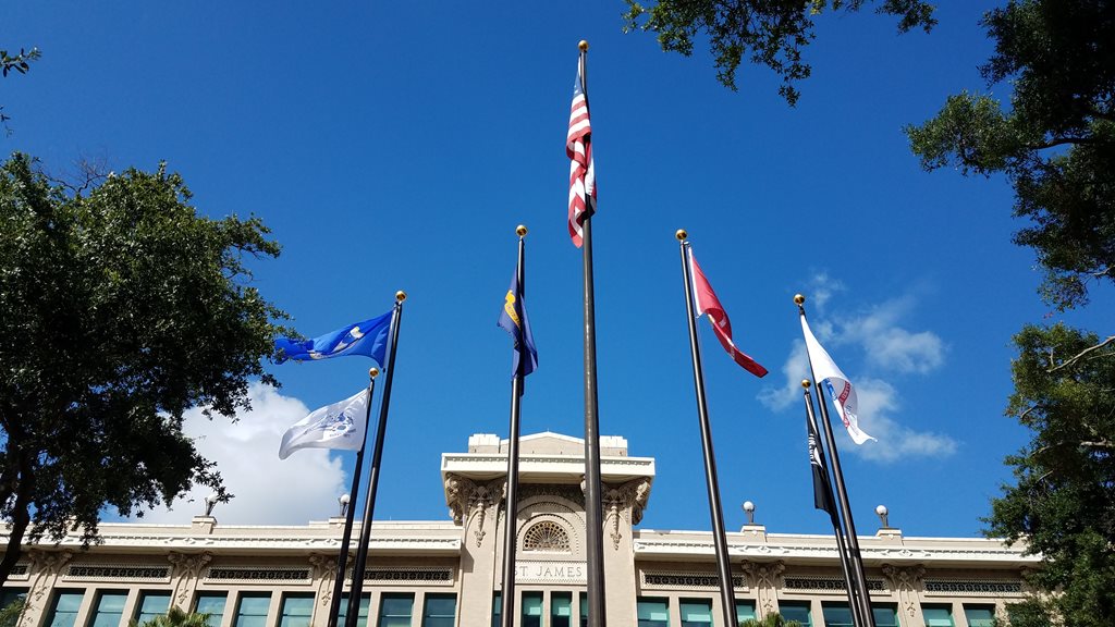 The United States, military branch & POW/MIA flags in front of City Hall
