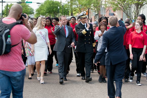 Mayor Lenny Curry and U.S. Surgeon General Dr. Vivek Murthy walkign to Hemming Park with I'm A Start Foundation students to launch the Journey to One health initiative