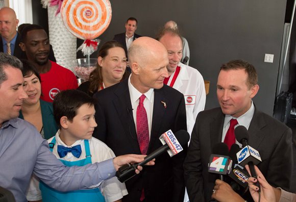 Mayor Lenny Curry takes questions with Governor Rick Scott during a visit to Sweet Pete's in Downtown Jacksonville in Dec. 2015
