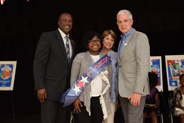 July 18, 2019 photo of Council Members Freeman and Boylan with a student.