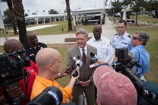 Director Jacobsen of Emergency Preparedness leading a media availability about the impact of Hurricane Sandy on Georgia-Florida festivities