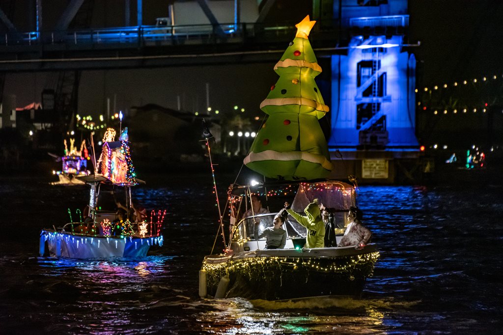 Boats adorned with christmas lights and decorations