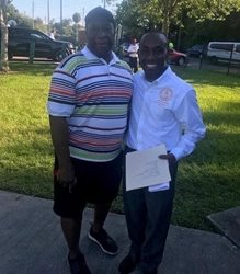 August 7, 2018 photo of Council Member Garrett Dennis at the National Night Out Against Crime held at Mallison Park.
