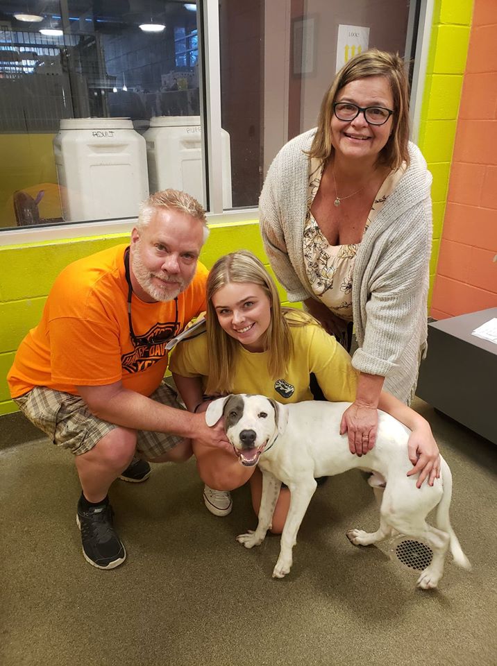 A family with their newly adopted pet at the ACPS Shelter