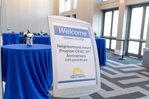 Sign with text: Welcome October 19, 2023 Neighborhood Award Program-CPAC 30th Anniversary 6:00 pm - 9:00 pm