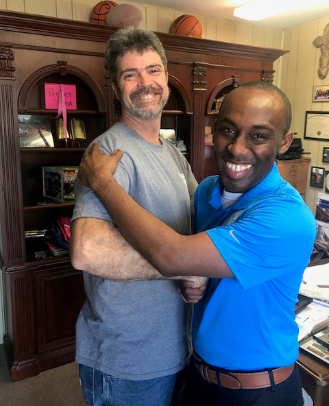 March 1, 2018 photo of Council Member Garrett Dennis with James Gandy, founder of the Hands & Feet Foundation.