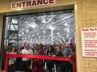February 8, 2018 photo of Council Member Garrett Dennis staff member Sandra Lane-Smith at the Grand Opening of Costco on the Westside of Jacksonville.