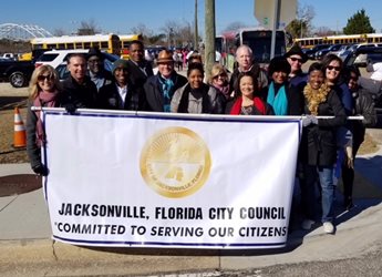 January 15, 2018 photo of Council Member Garrett Dennis with members of the community celebrating the Dr. Martin Luther King Jr. Parade downtown.