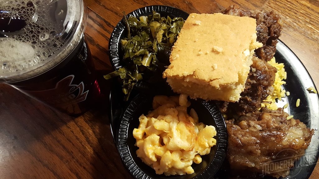 SOUL FOOD dinner plate with oxtails and corn bread