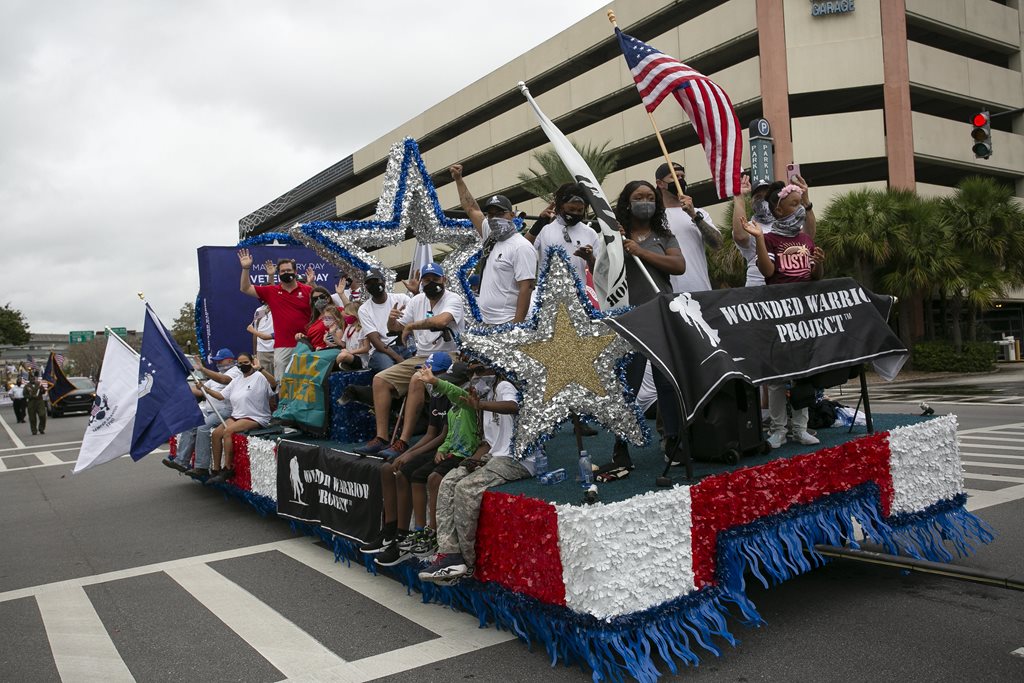 Wounded Warriors Project parade float filled with people