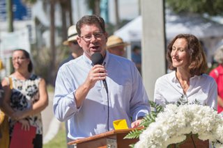 Photo of Council President Greg Anderson speaking at the dedication of the marker honoring the colonist of La Caroline.