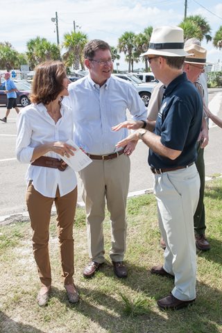 Photo of Council President Greg Anderson and his wife Beville speaking with Representative Lake Ray.