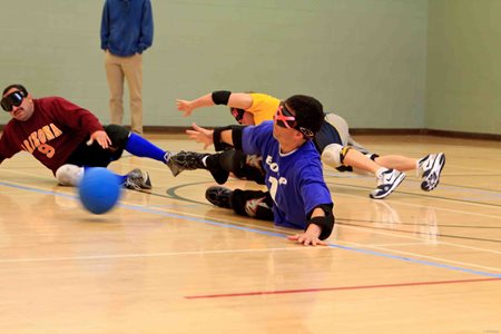 Players in the middle of a goalball game.