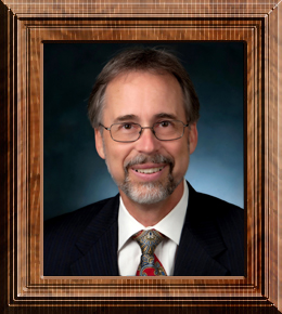 Framed photo of former Council Member Bill Bishop