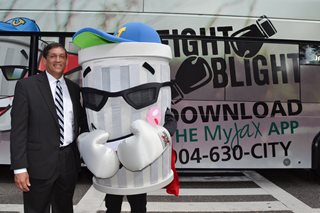 Photo of Intra-Governmental Services Director Paul Martinez with the Fight the Blight Mascot.