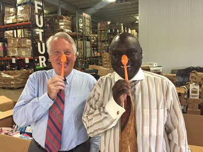 September 22, 2015 photo of Council Member Sam Newby and Feeding Northeast Florida CEO Bruce Ganger posing with spoons for the "Spoontember" campaign to fight hunger.